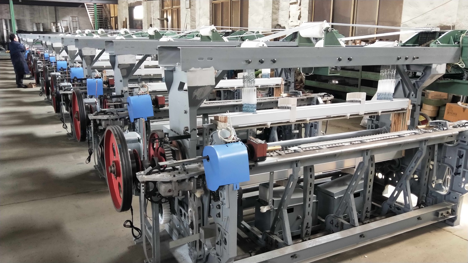 Multiple MG788 rapier looms prepared in a production batch