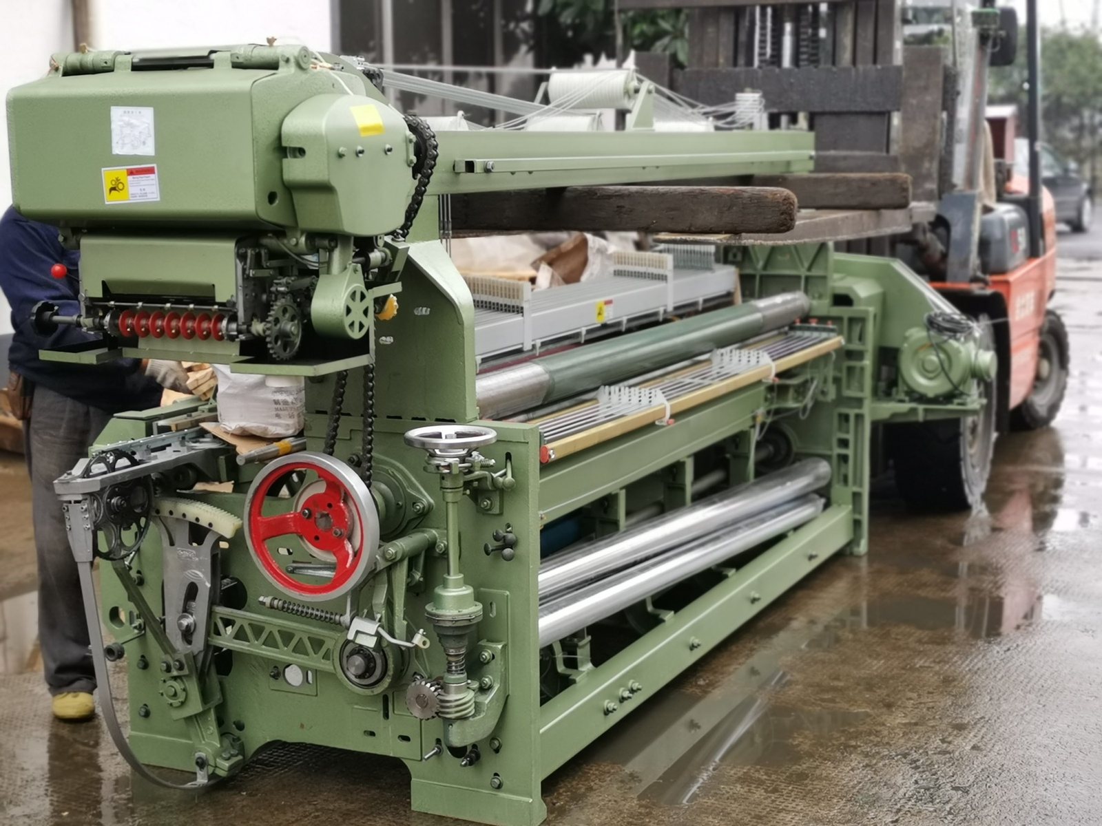 MG788 rapier loom with a side-mounted dobby and heald frames